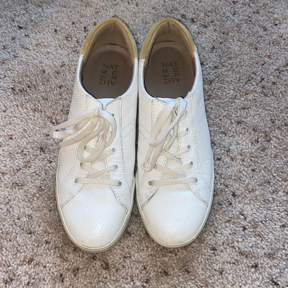 white sneakers. Worn once. Very comfortable! Size 10.5. Will fit Size 10 as well